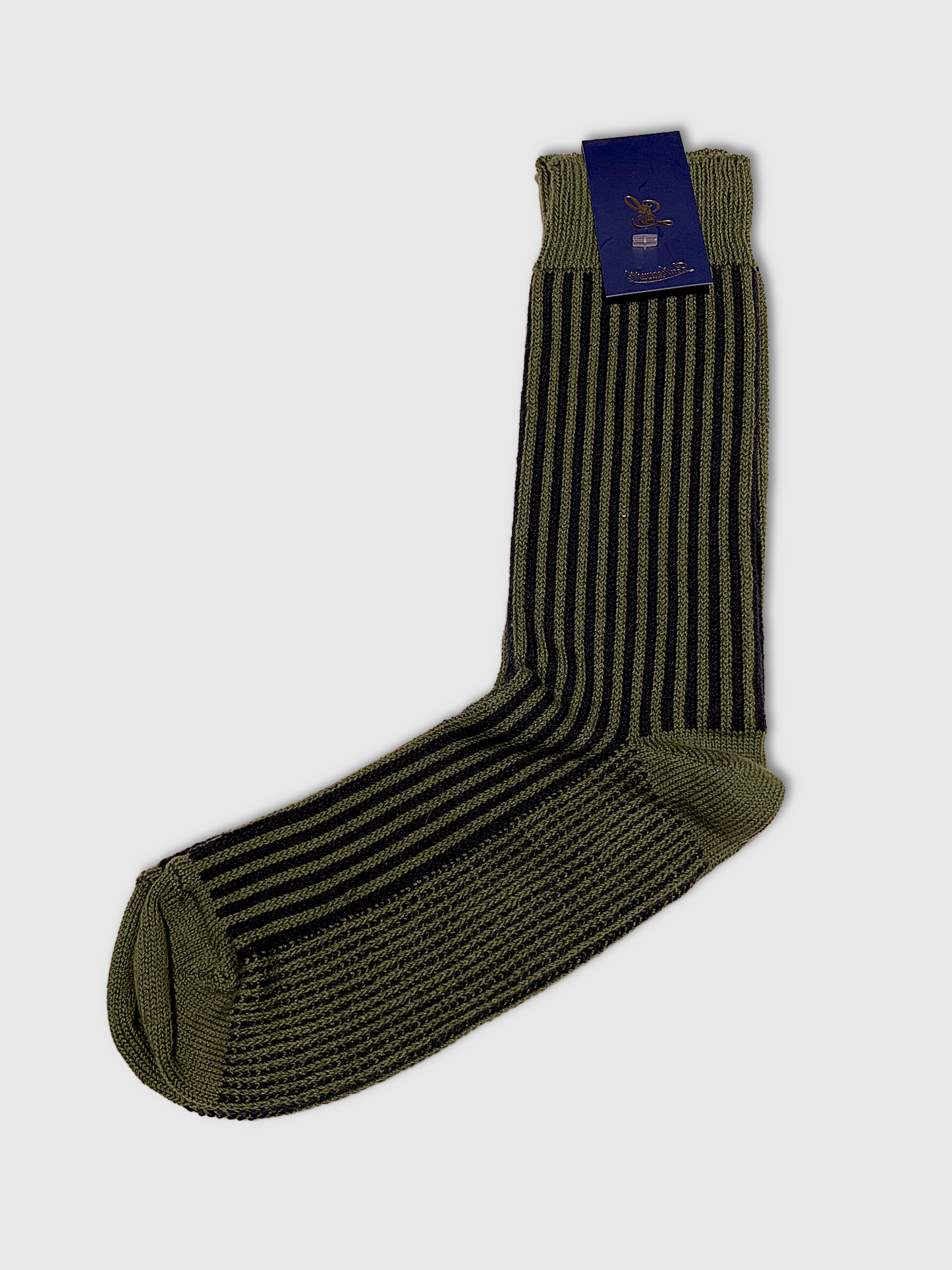 Green striped sock with a brand label on a light gray background