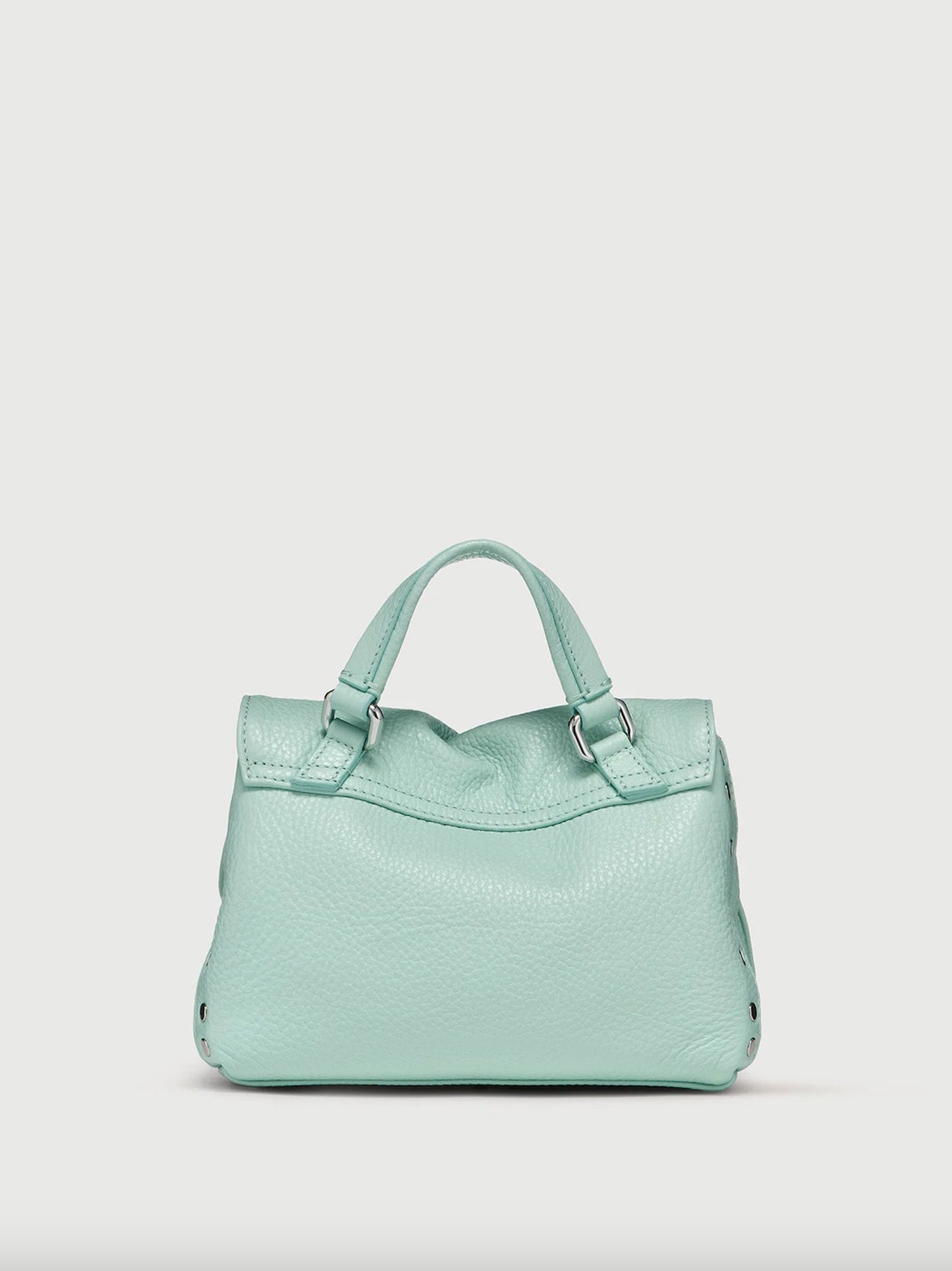 Light blue handbag on a light gray background