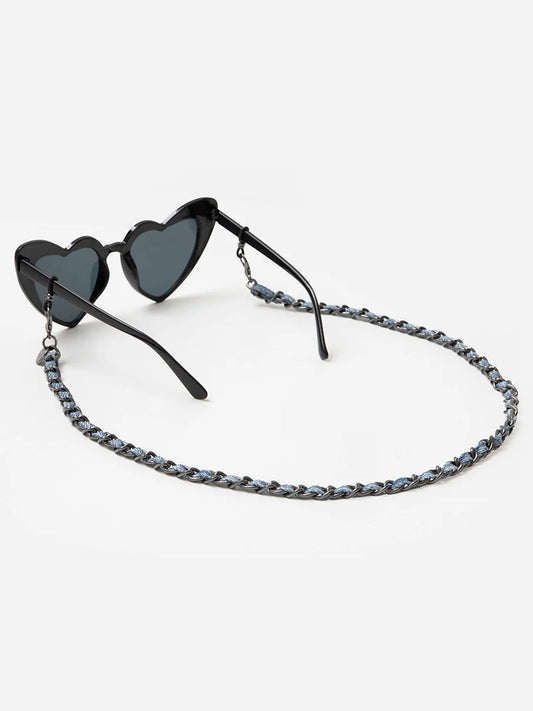 Heart-shaped sunglasses with a chain strap on a white background
