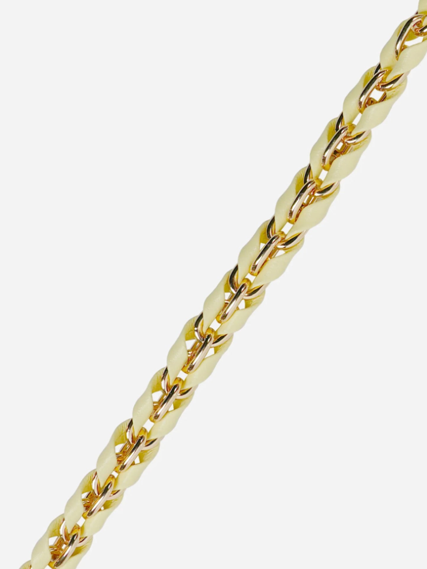 Gold and yellow phone chain on a white background