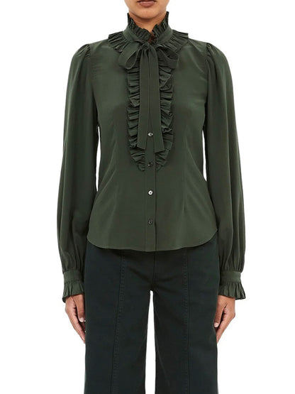 Green blouse with ruffled details on a white background