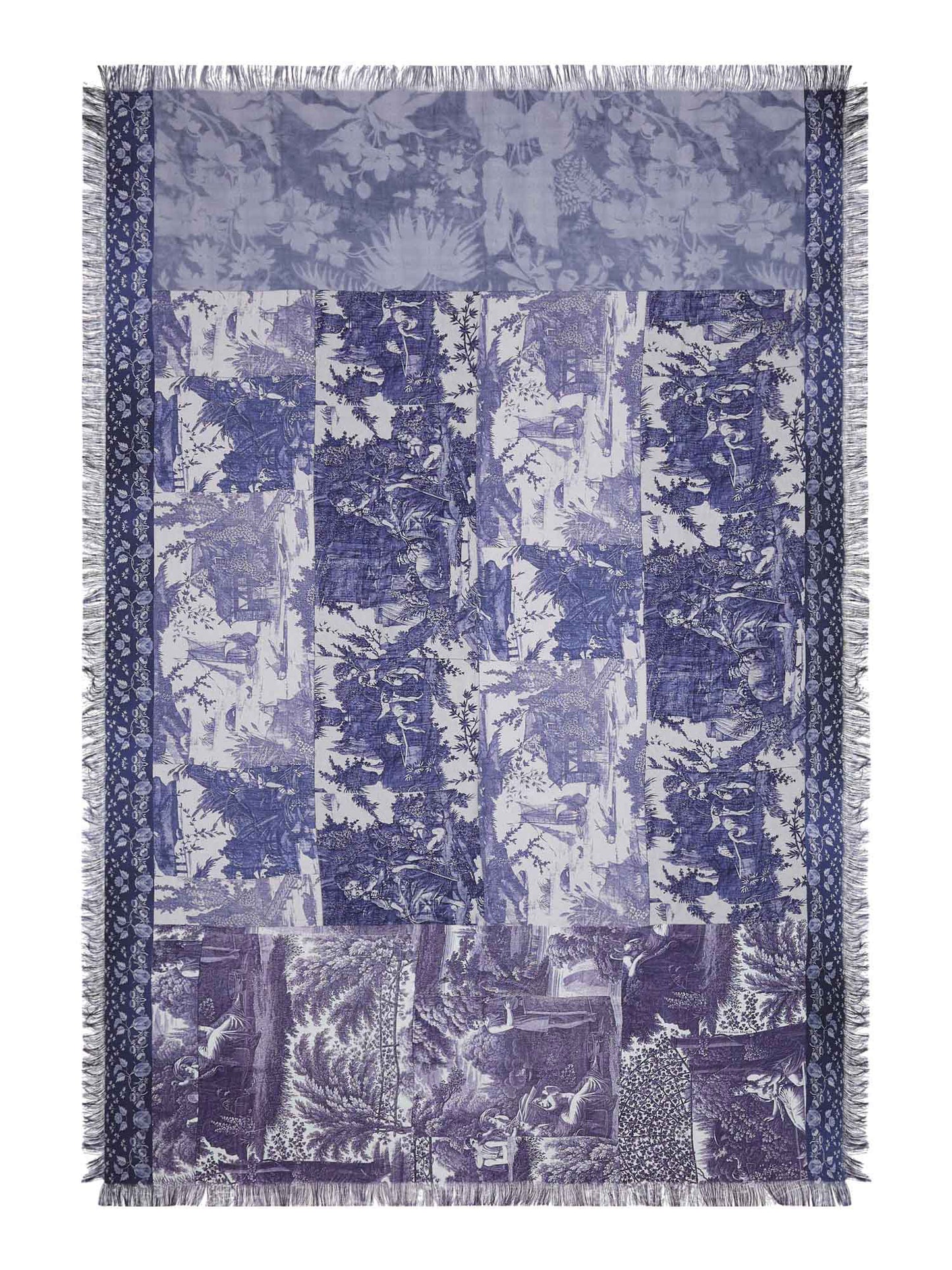 Blue and white patterned throw scarf with fringes on a white background