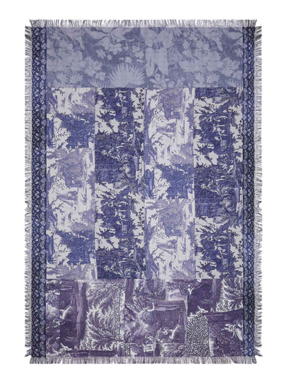 Blue and white patterned throw scarf with fringes on a white background