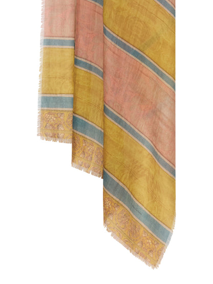 A folded striped scarf in mustard yellow, dusty pink, and light blue with intricate gold-toned border patterns, shown against a plain white background.