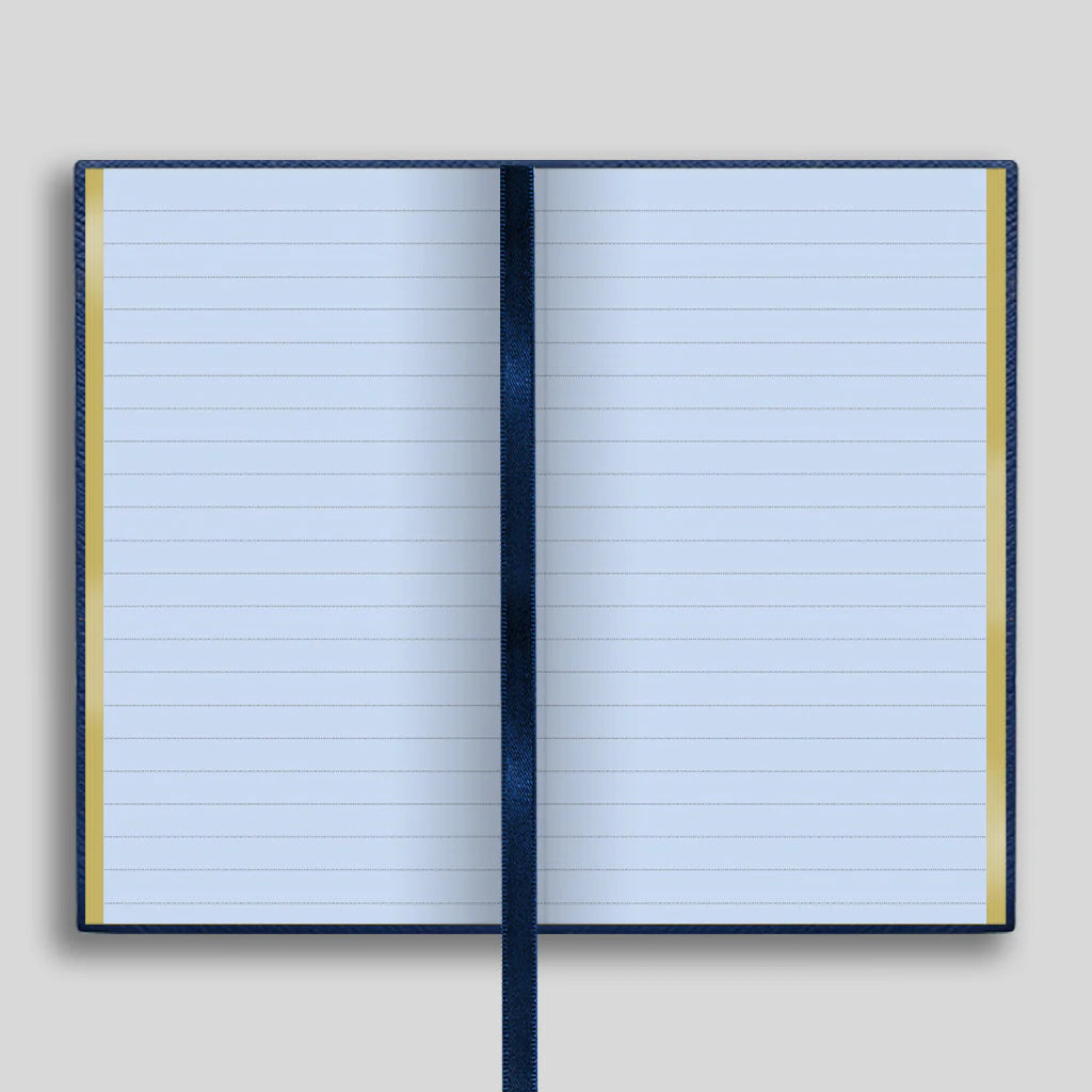 Open notebook with lined pages on a light gray background
