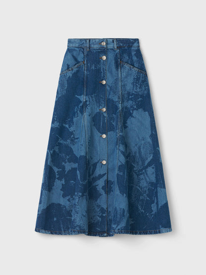 Blue denim skirt with button details on a white background