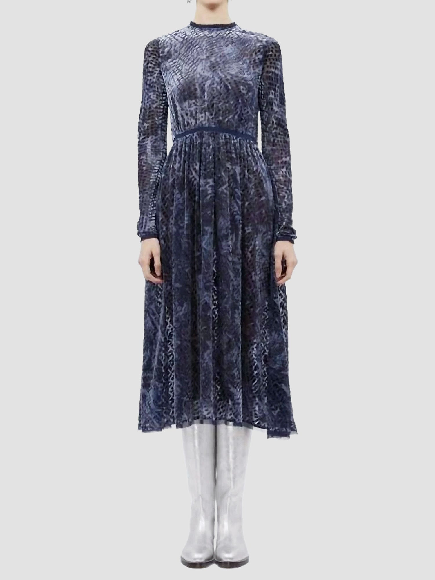 Long-sleeve dress with a pattern on a white background