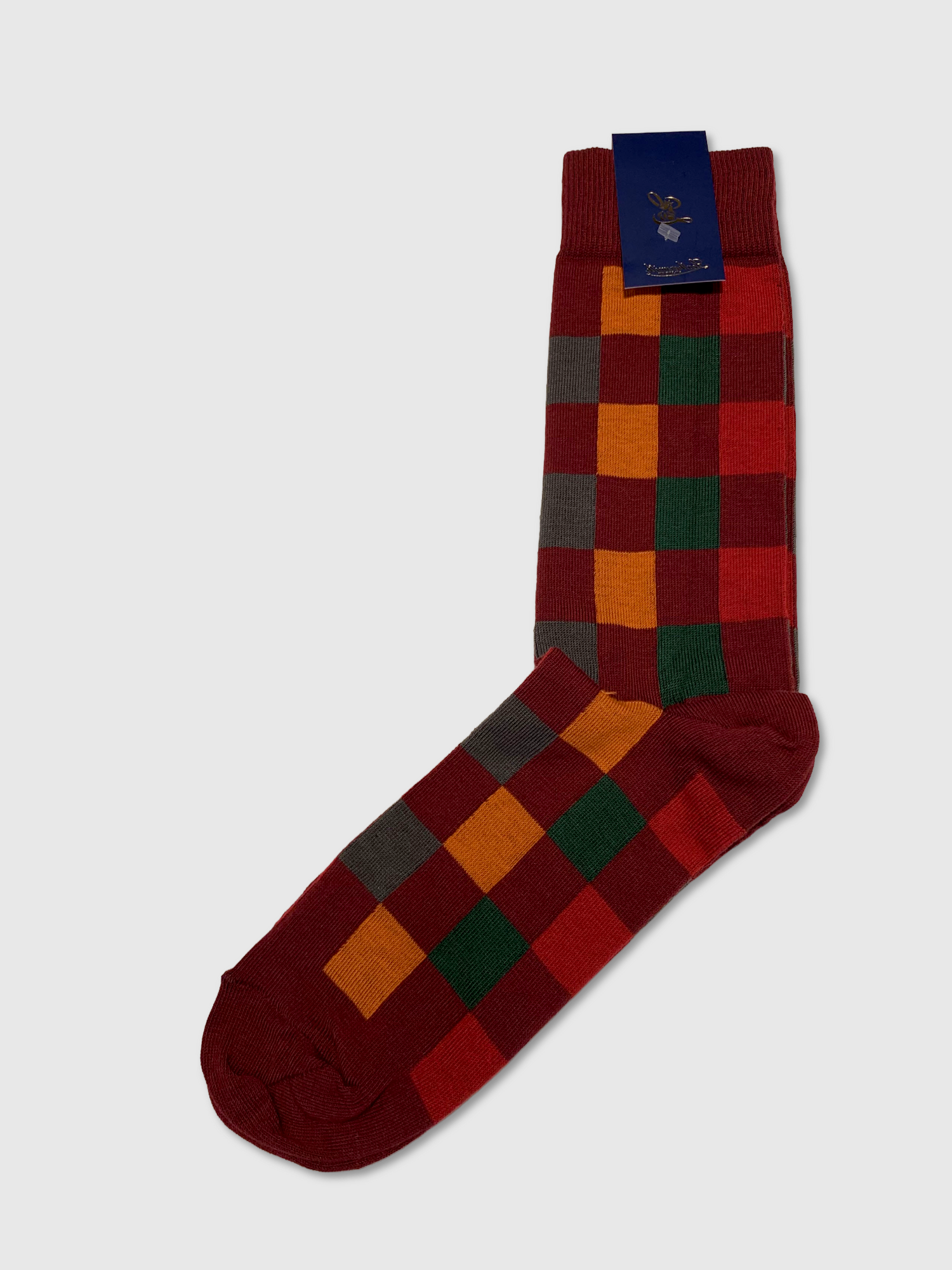 Checkered sock with a brand label on a white background