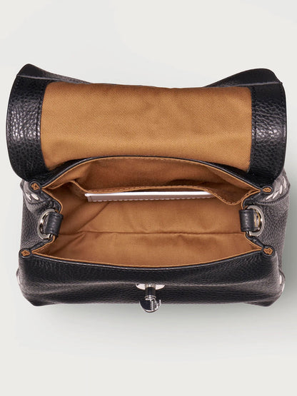 Black leather handbag with brown interior on a white background