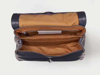 Open navy leather bag on a white background