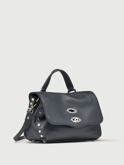 Dark navy handbag with silver accents on a light gray background